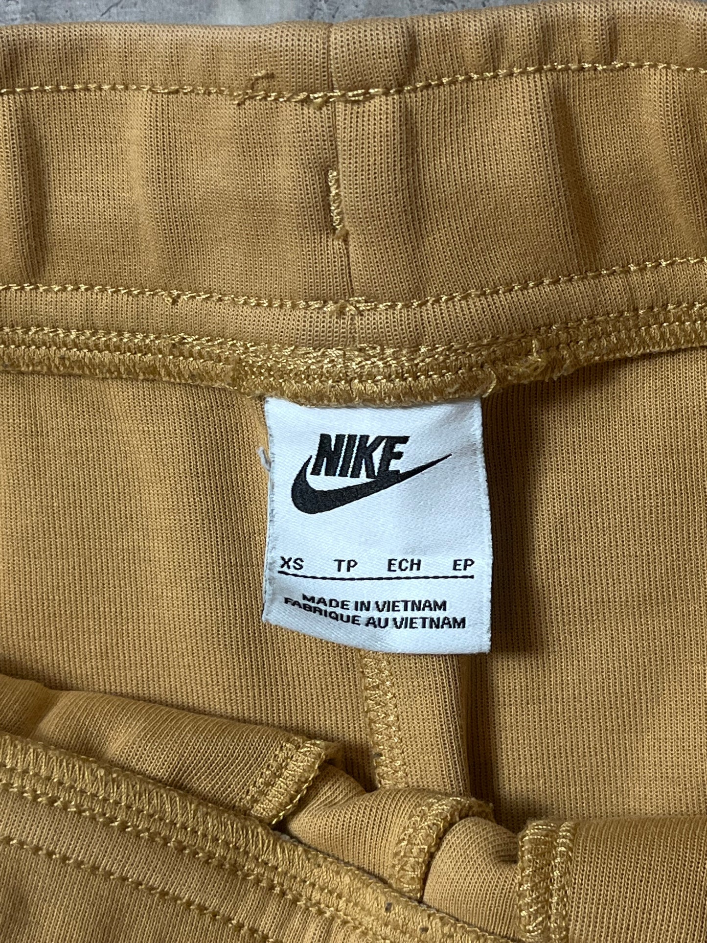 Nike Tech Fleece Gold muška trenerka (XS)